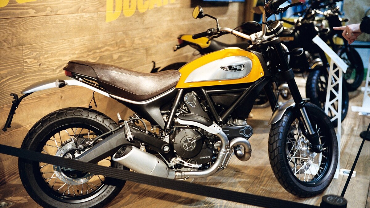 Ducati Scrambler jaune illustrant les marques moto italiennes